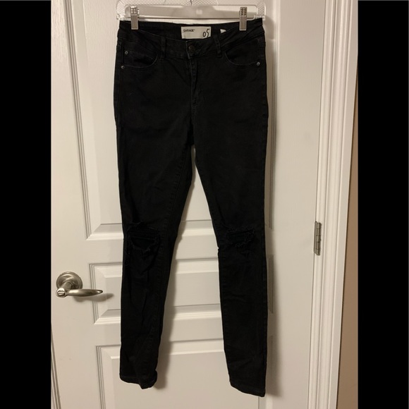 Black ripped jeans (garage)